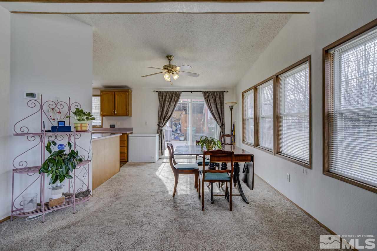 600 Theobald Reno, NV 89521 - Photo 9 of 25 a dining room with furniture and a large window