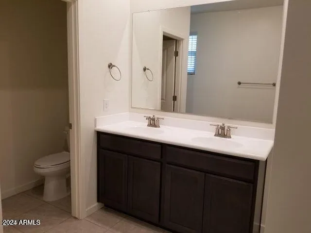 a bathroom with a sink and a toilet