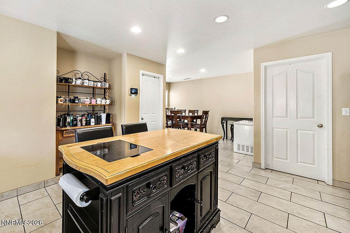 11365 Torino Way Reno, NV 89521 - Photo 15 of 29 a kitchen that has a sink and a stove in it