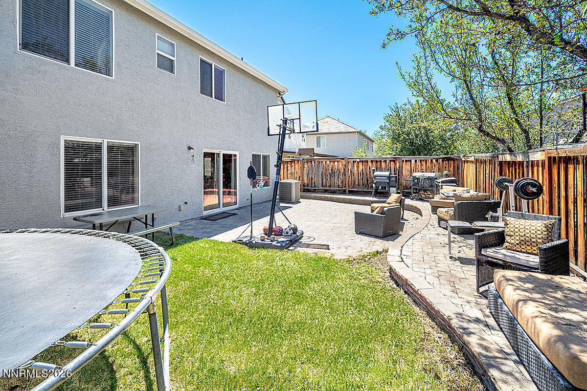 11365 Torino Way Reno, NV 89521 - Photo 29 of 29 a view of a house with swimming pool and sitting area
