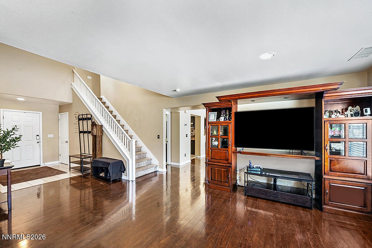 11365 Torino Way Reno, NV 89521 - Photo 8 of 29 a living room with furniture and a flat screen tv