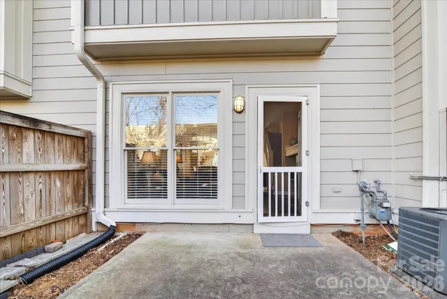 a view of a house with a large window