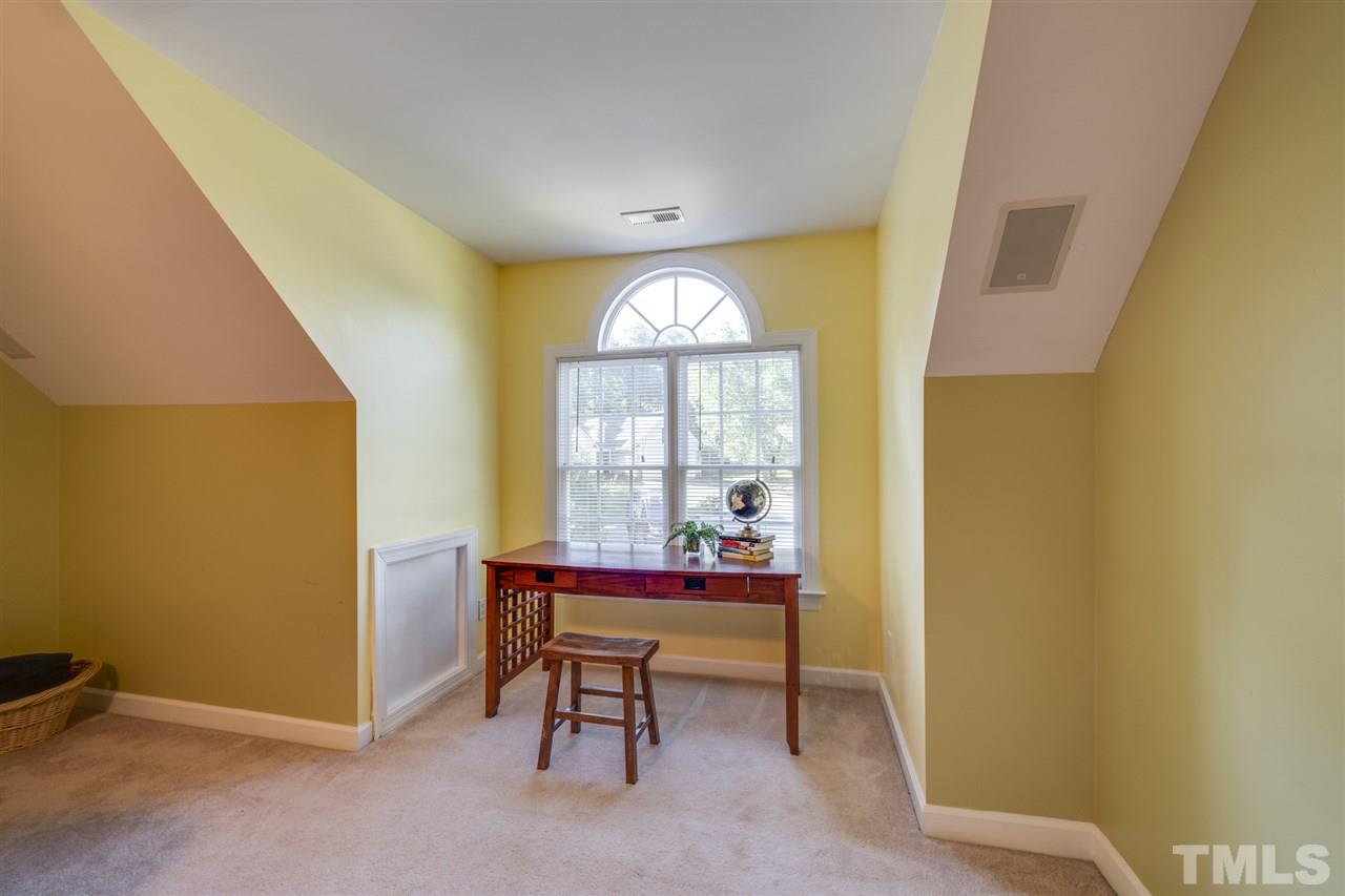 11921 Larka Court Raleigh, NC 27613 - Photo 22 of 30 a view of a room with furniture and a window