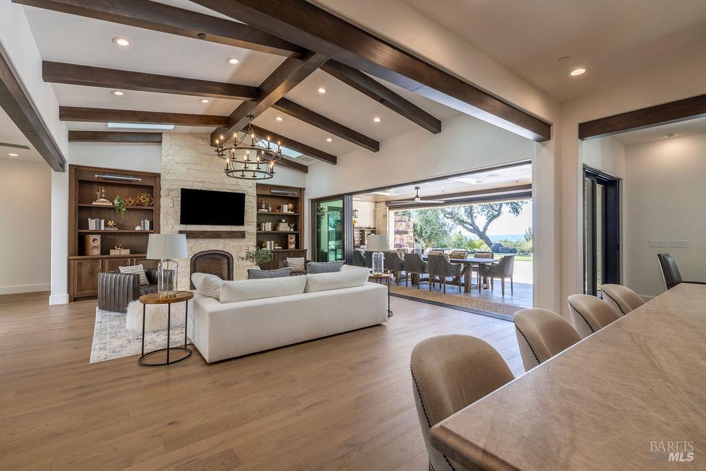 3981 Parker Hill Road Santa Rosa, CA 95404 - Photo 15 of 43 a living room with furniture and a flat screen tv