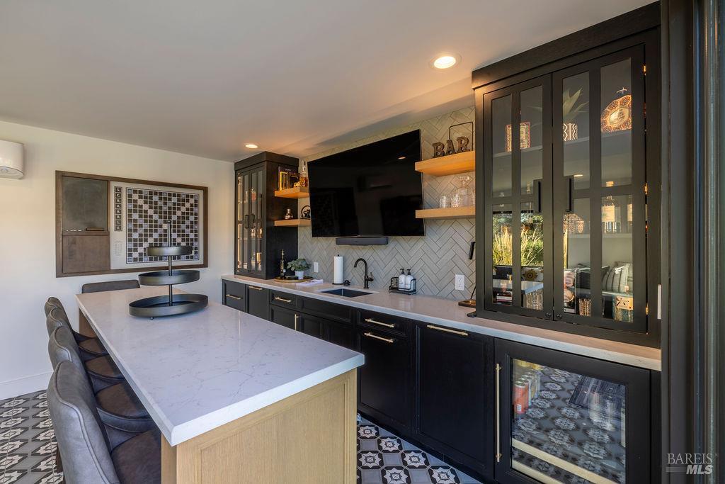 3981 Parker Hill Road Santa Rosa, CA 95404 - Photo 37 of 43 a kitchen with a stove a sink and a refrigerator