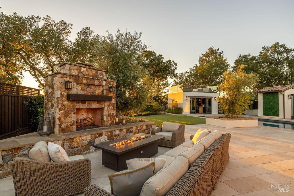 3981 Parker Hill Road Santa Rosa, CA 95404 - Photo 39 of 43 a outdoor living space with patio furniture and a fireplace
