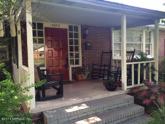 4052 Dover Road Jacksonville, FL 32207 - Photo 1 of 14 front view of a house with a yard