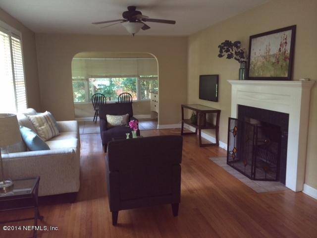 4052 Dover Road Jacksonville, FL 32207 - Photo 4 of 14 a living room with furniture and a fireplace