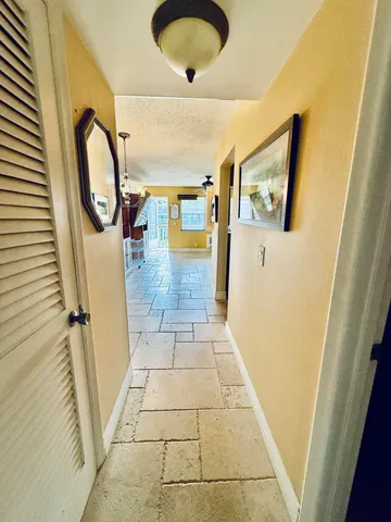 a view of entryway with a door