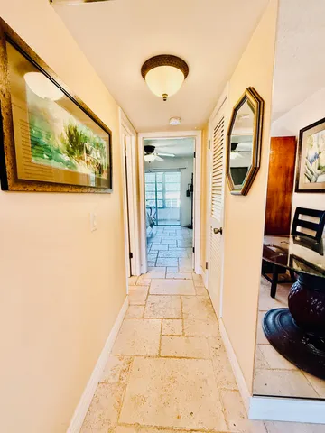 a view of hallway with washer and dryer