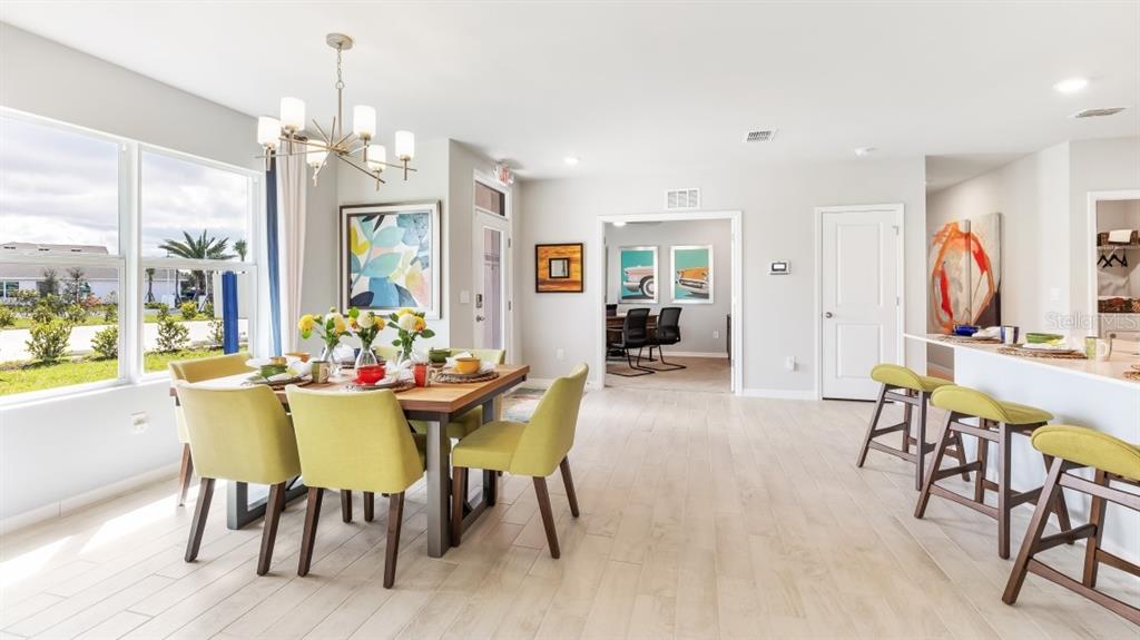9467 Sunbeam Circle Punta Gorda, FL 33950 - Photo 8 of 15 a view of a dining room with furniture window and outside view