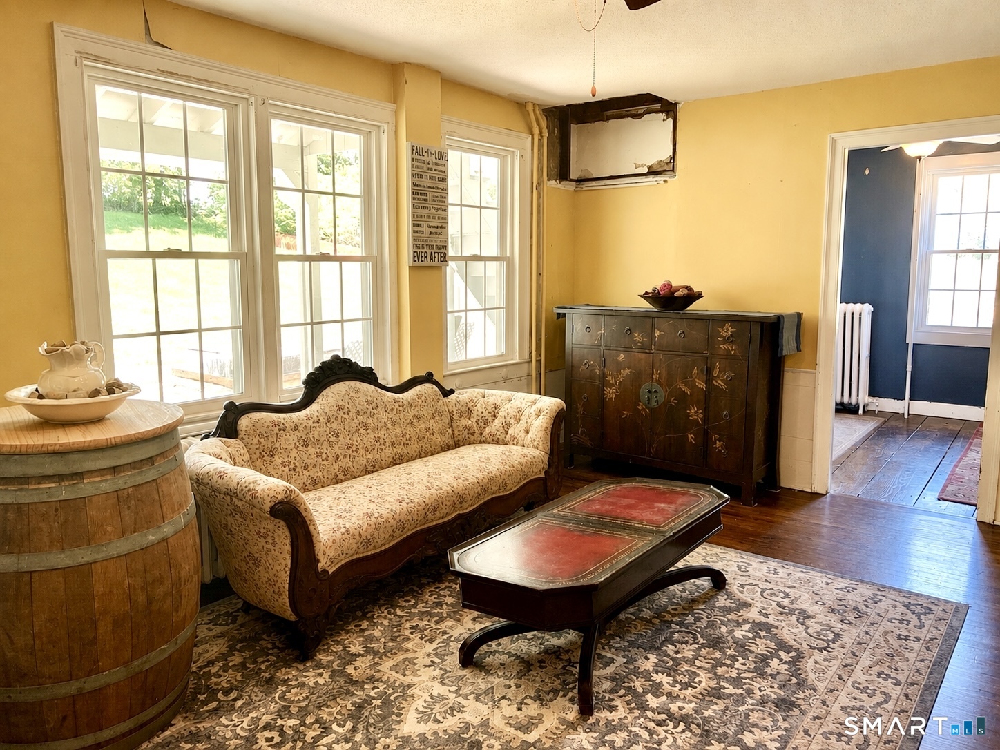443 Amity Road Bethany, CT 06524 - Photo 14 of 30 a living room with furniture and a window