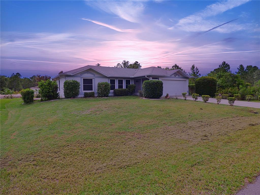 149 Triangle Street Port Charlotte, FL 33954 - Photo 1 of 1 149 Triangle St 3be 2ba 2 car garage extra wide lanai with western exposure
