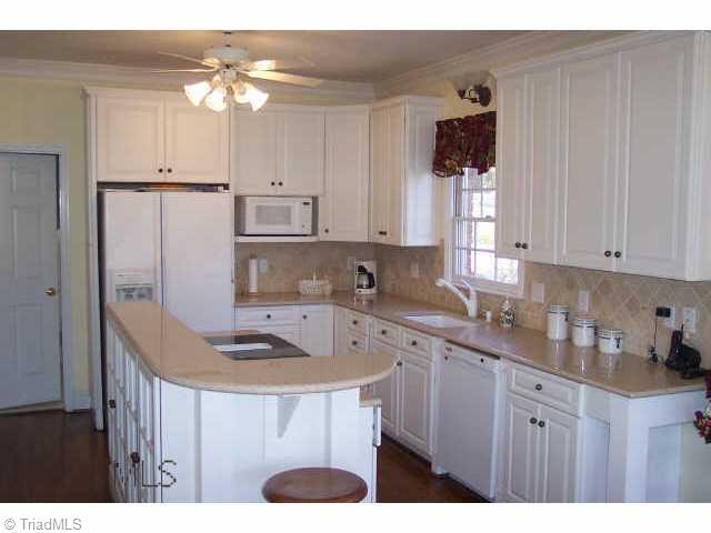 8080 Glengarriff Road Clemmons, NC 27012 - Photo 3 of 9 Other. Kitchen with sold surface counters and display island
