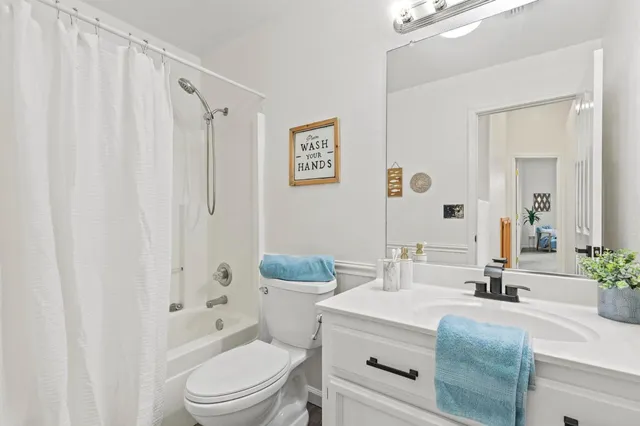 a view of kitchen with furniture and wooden floor