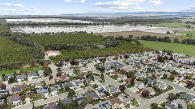 an aerial view of a city with lots of residential buildings