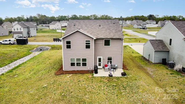 a view of a house with a swimming pool