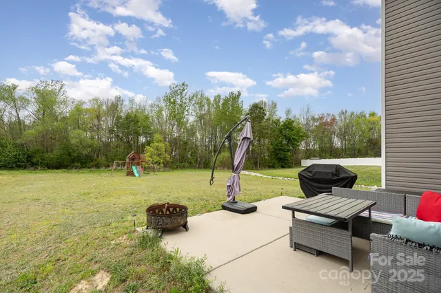 a view of a garden and basketball court