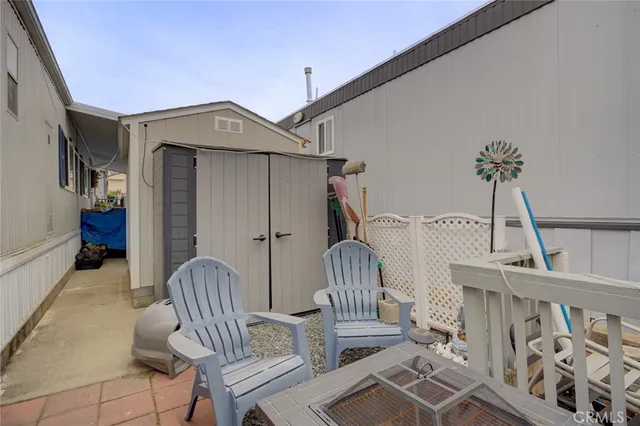 a view of balcony with furniture