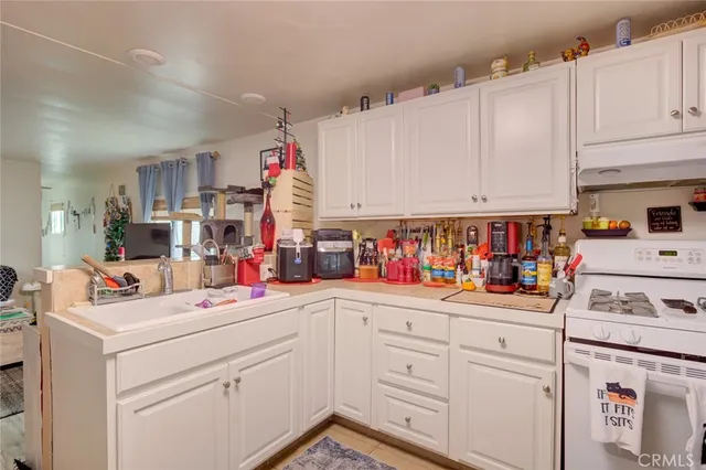 a utility room with closet dryer and washer