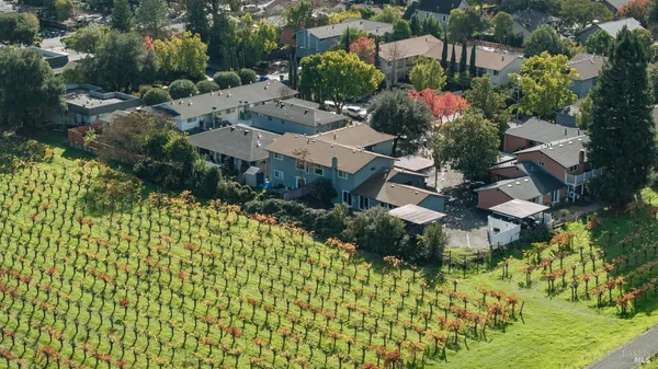 an aerial view of multiple house