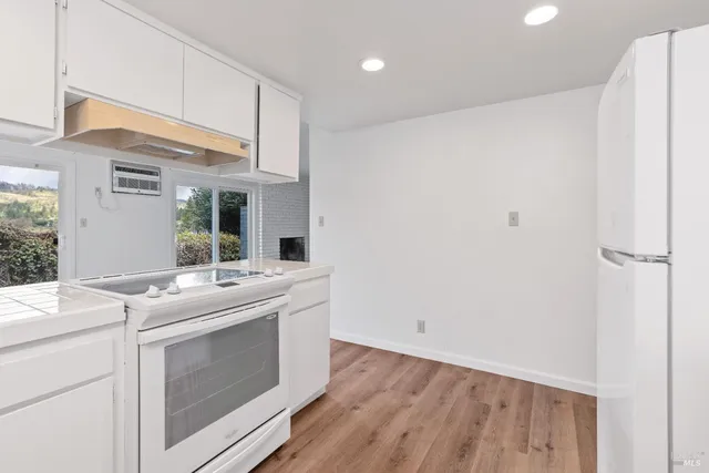 a utility room with washer and dryer