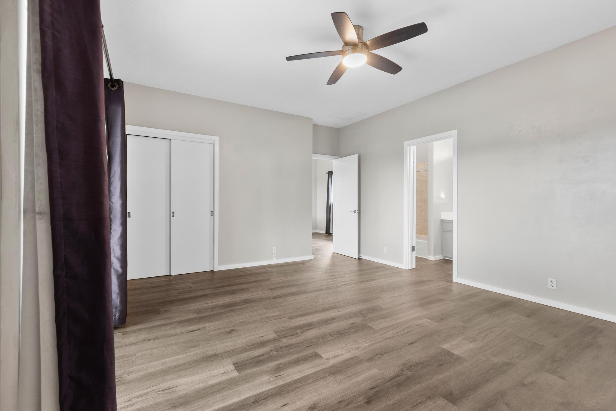 234 Kipa Street Hilo, HI 96720 - Photo 22 of 30 a view of an empty room with wooden floor
