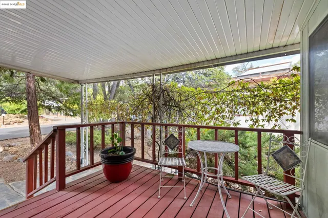 a view of a chairs and table on the wooden floor