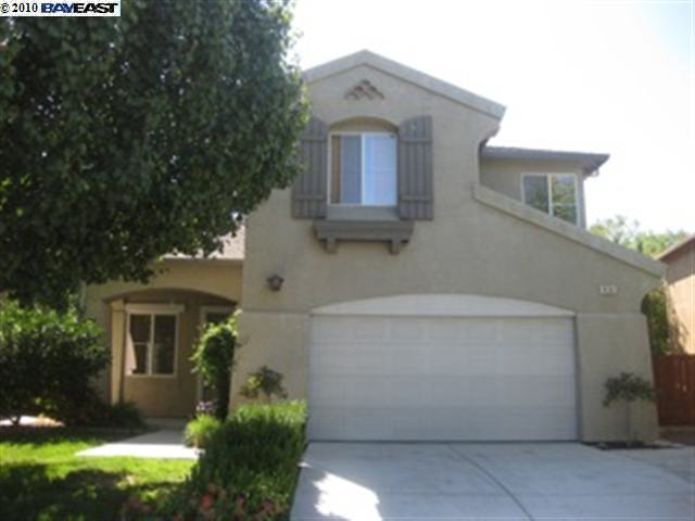 4151 Mt Isabel Road Antioch, CA 94531 - Photo 1 of 1 a front view of a house with a yard