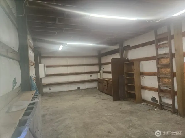 a view of wooden door and chair in the patio