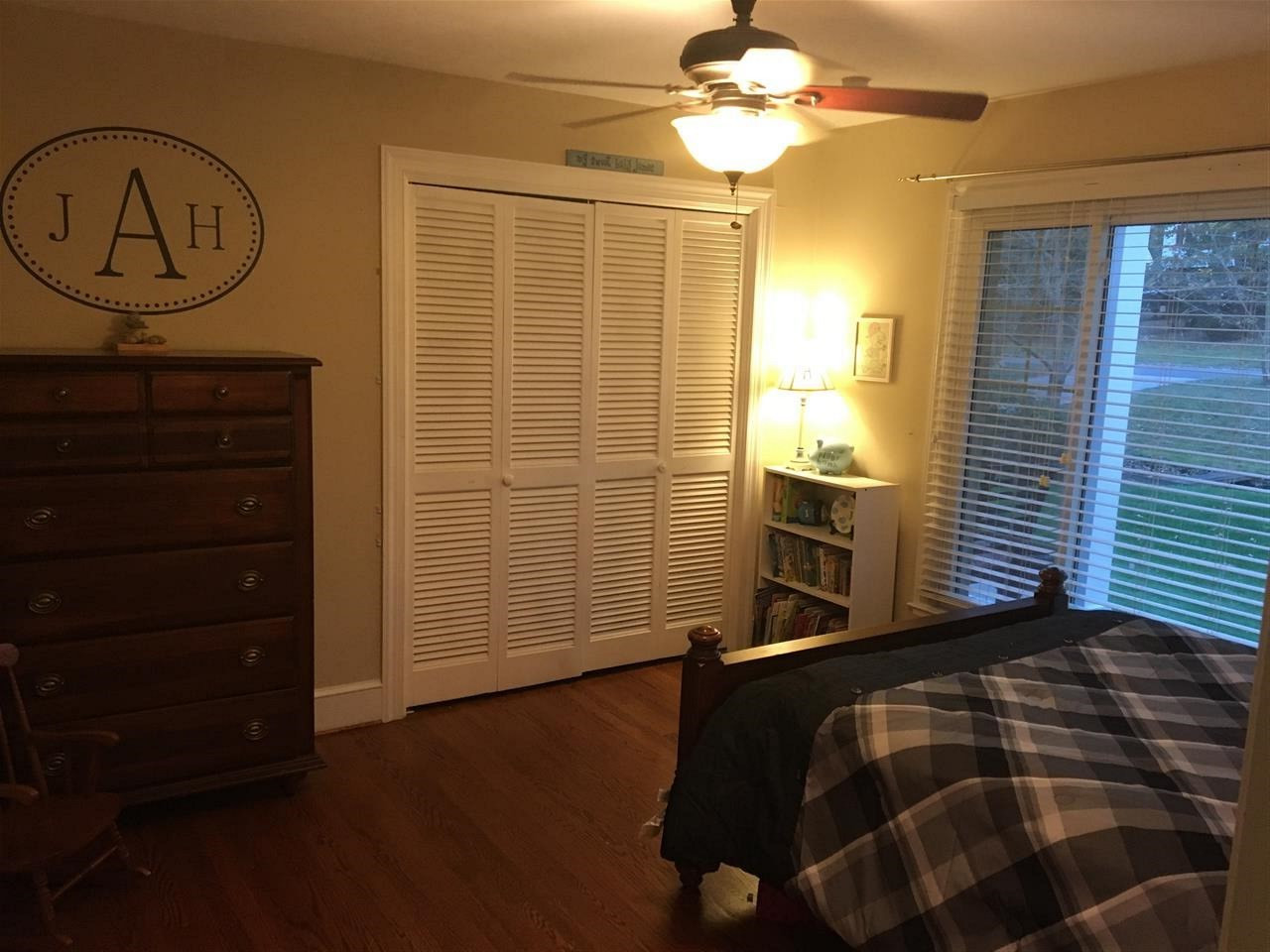 1101 Ivy Lane Raleigh, NC 27609 - Photo 17 of 25 Another spacious guest bedroom with hardwoods and large window