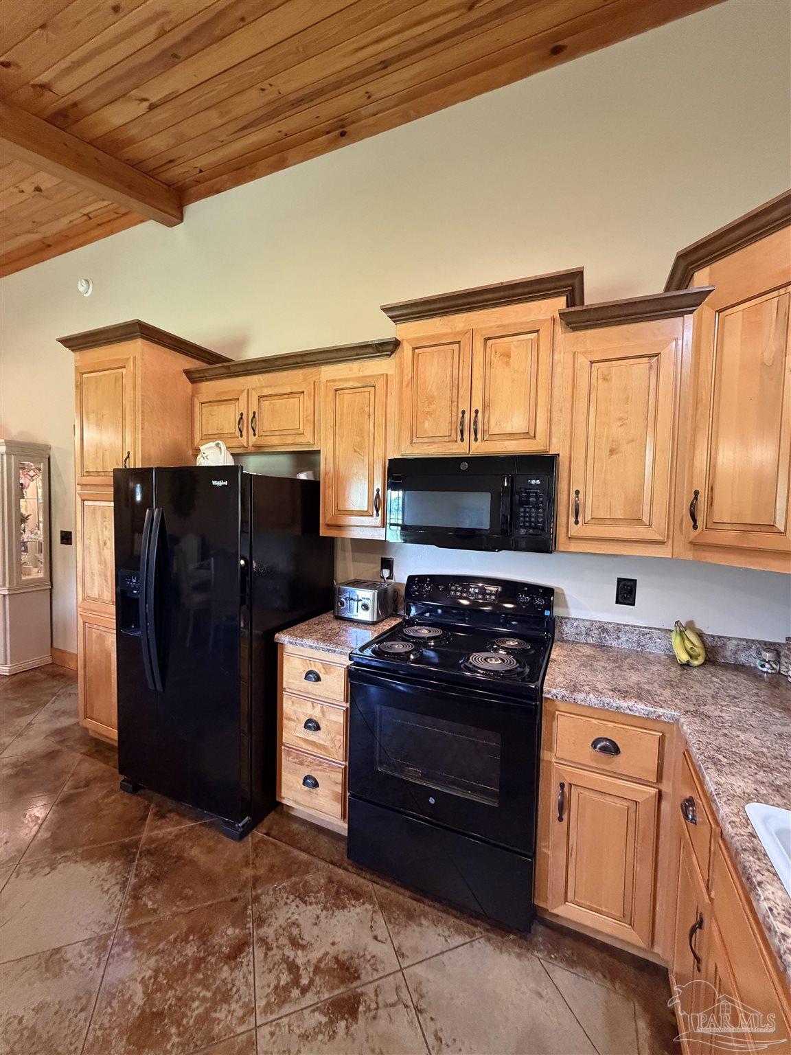 145 Tower Road Uriah, AL 36480 - Photo 6 of 72 a kitchen with stainless steel appliances granite countertop a refrigerator stove and sink