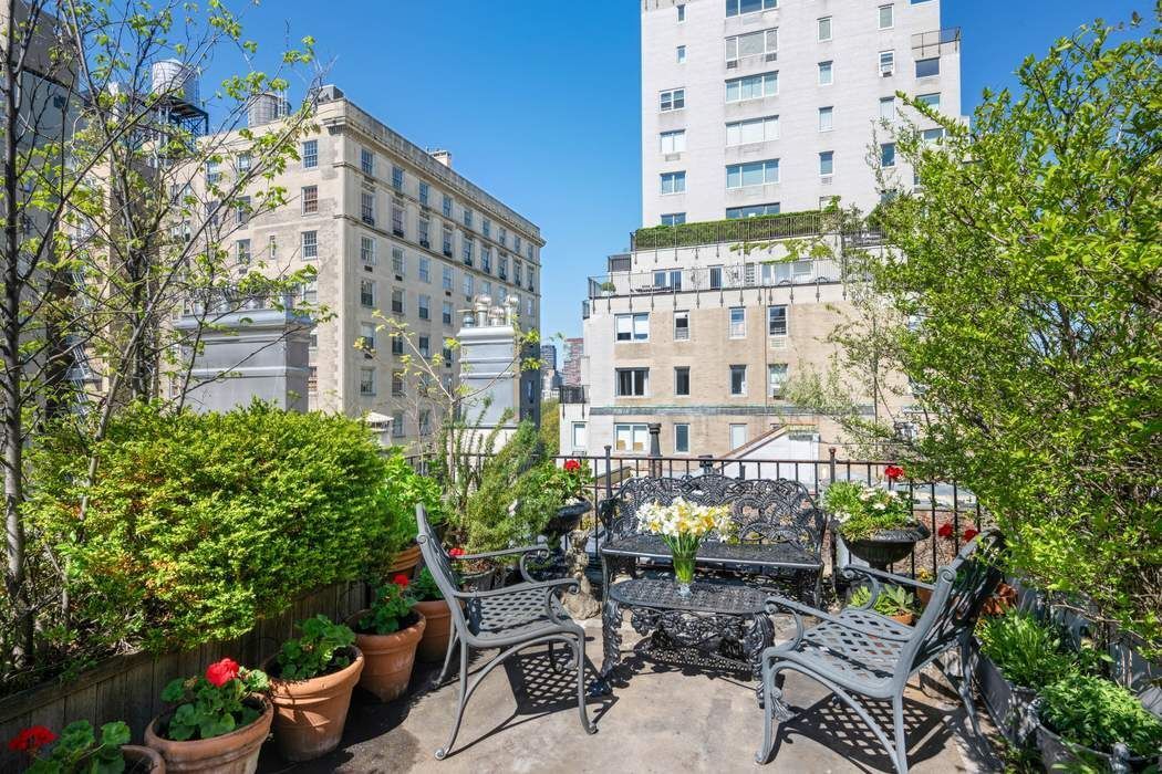 11 East 73rd Street, Unit PH Manhattan, NY 10021 - Photo 10 of 18 a view of a patio with plants and outdoor seating