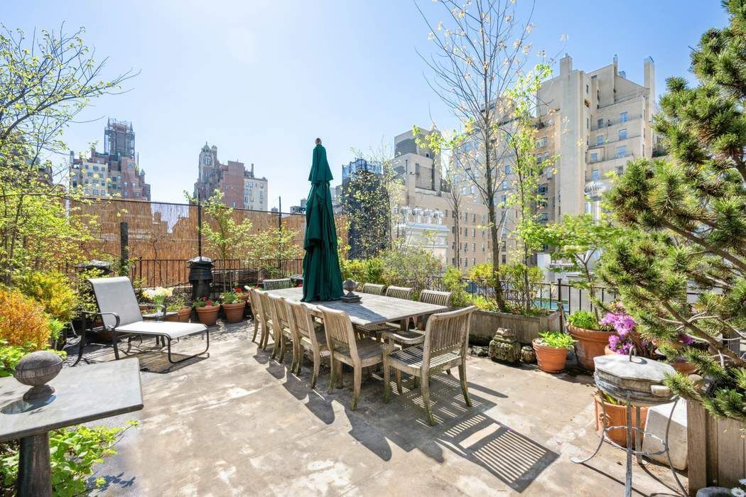 11 East 73rd Street, Unit PH Manhattan, NY 10021 - Photo 11 of 18 a building outdoor space with patio furniture and potted plants