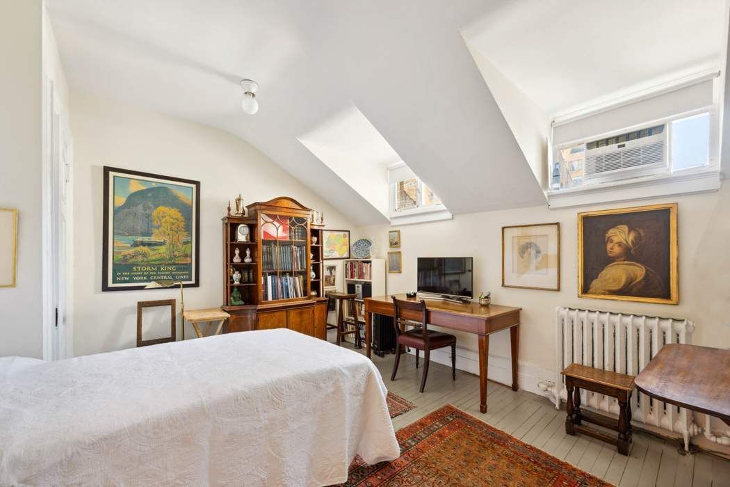 11 East 73rd Street, Unit PH Manhattan, NY 10021 - Photo 17 of 18 a bedroom with furniture and a window