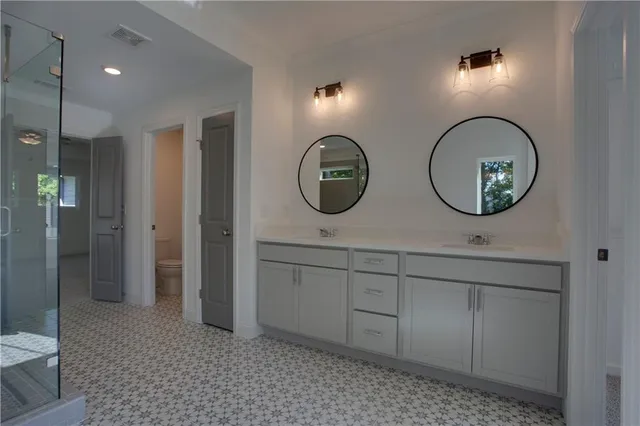 a view of a livingroom with a ceiling fan and window
