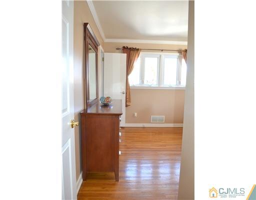 9 Dorian Road Metuchen, NJ 08840 - Photo 22 of 25 a view of a living room with a large window