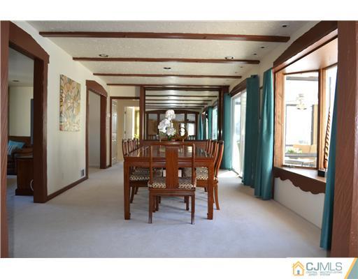 9 Dorian Road Metuchen, NJ 08840 - Photo 6 of 25 a view of a dining room with furniture and window