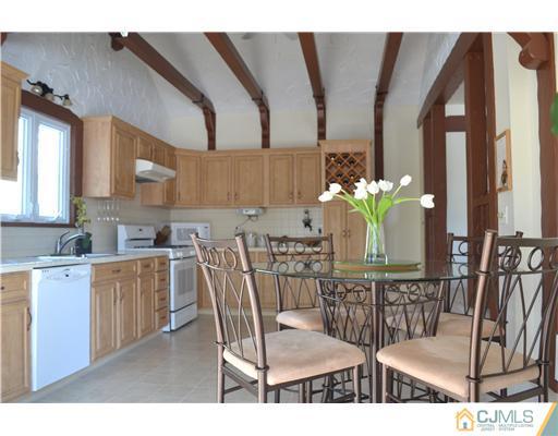 9 Dorian Road Metuchen, NJ 08840 - Photo 10 of 25 a dining room with furniture and wooden floor
