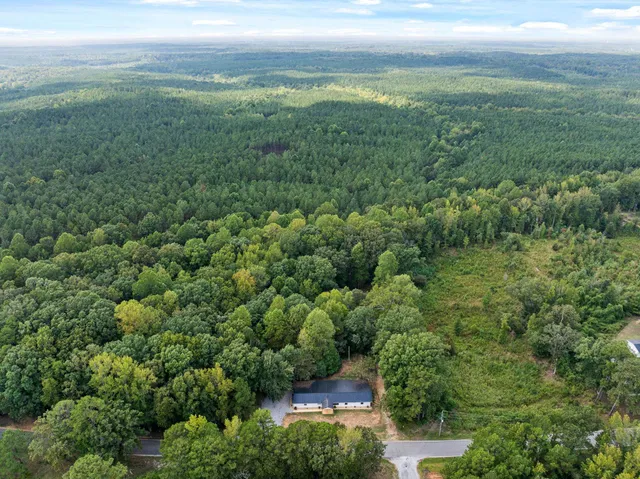 a view of a yard with an trees