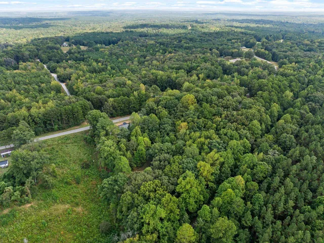 a view of a yard with an outdoor space