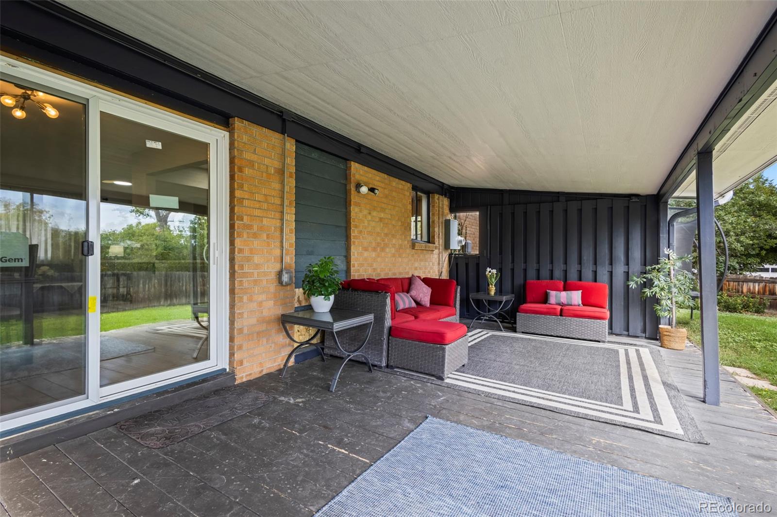 390 Scranton Street Aurora, CO 80011 - Photo 14 of 45 a bench sitting in front of a building