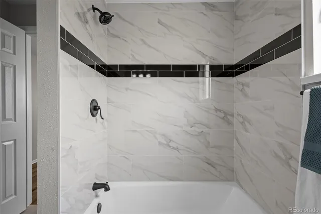 a bathroom with a shower and a shower view