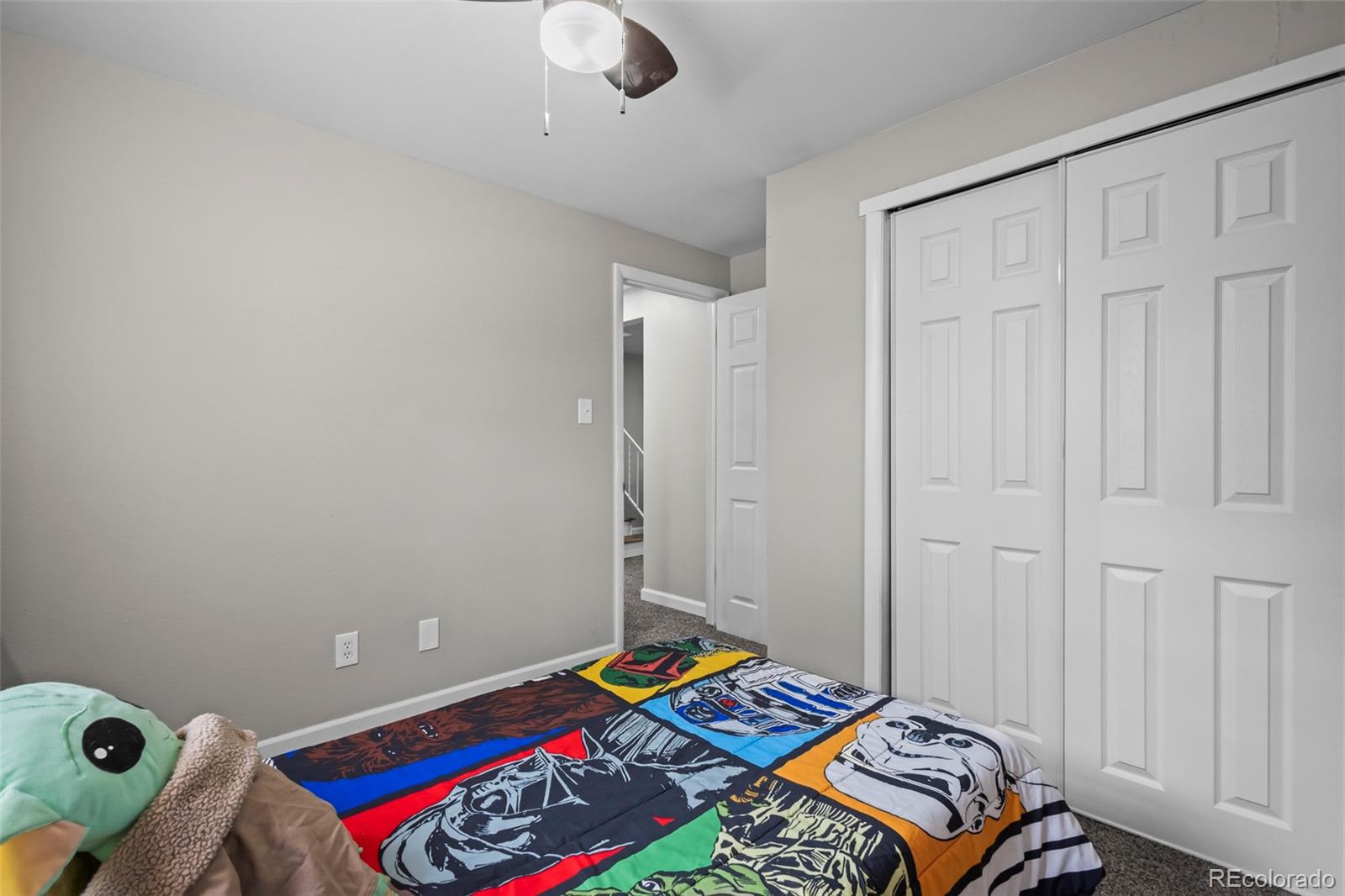 390 Scranton Street Aurora, CO 80011 - Photo 29 of 45 a room with a bed and a window