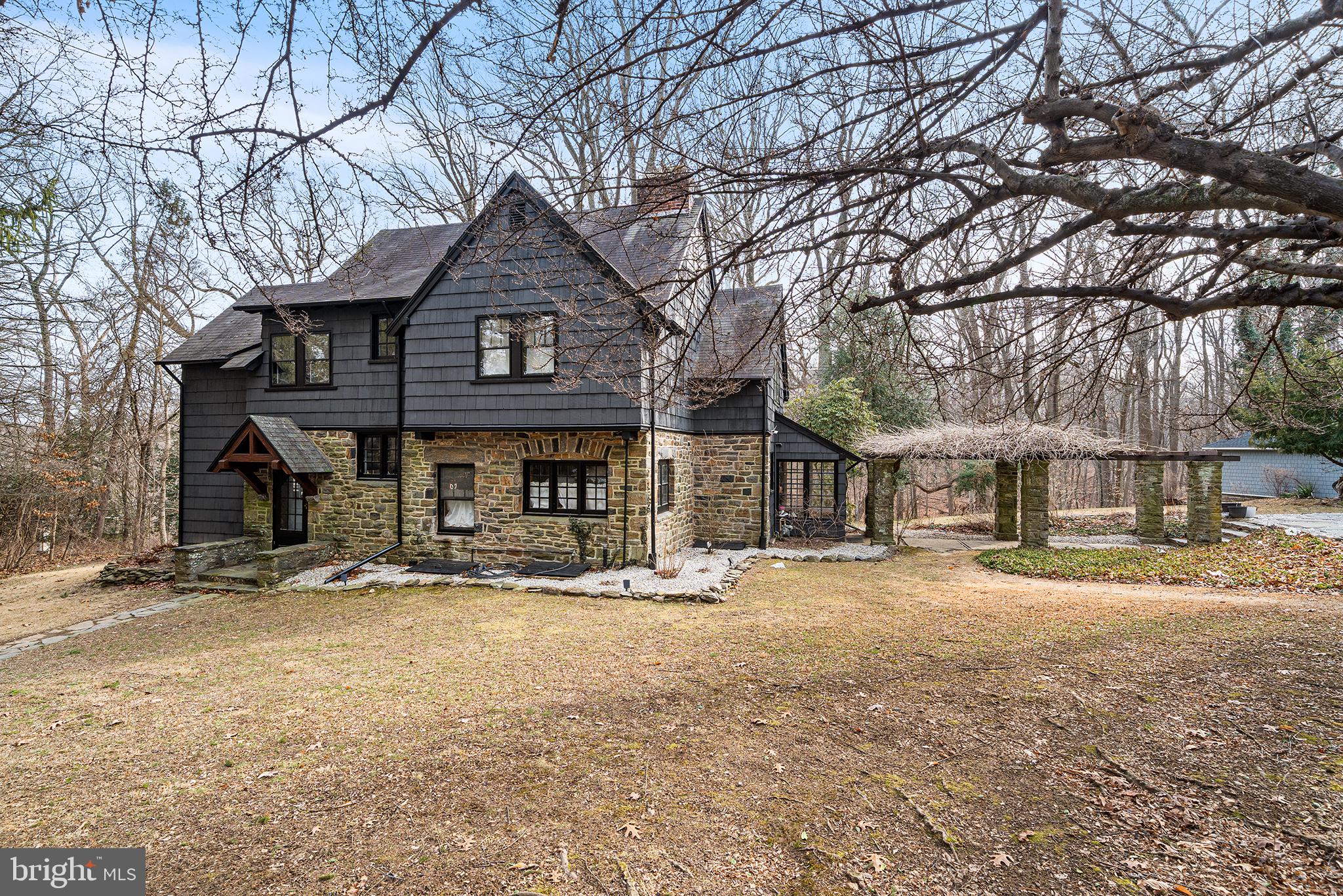 238 Fox Road Media, PA 19063 - Photo 1 of 74 a front view of a house with a yard