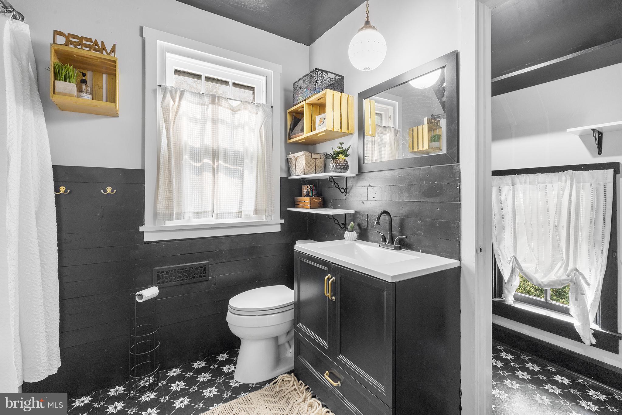 238 Fox Road Media, PA 19063 - Photo 25 of 74 a bathroom with a sink a toilet and shower