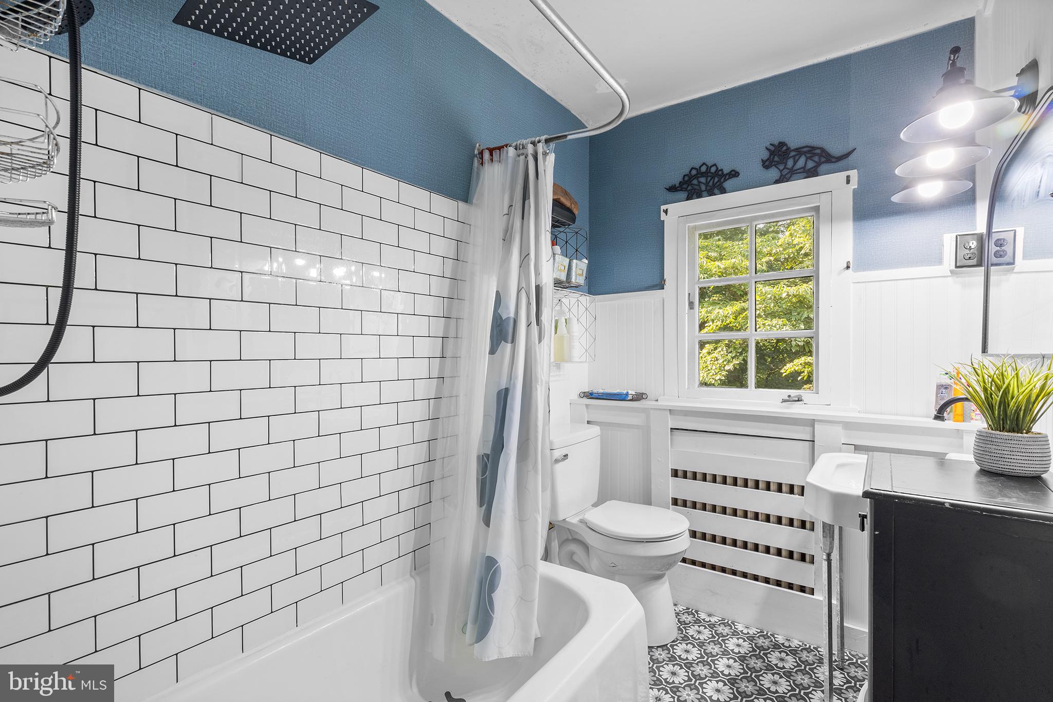238 Fox Road Media, PA 19063 - Photo 32 of 74 a bathroom with a bathtub and window