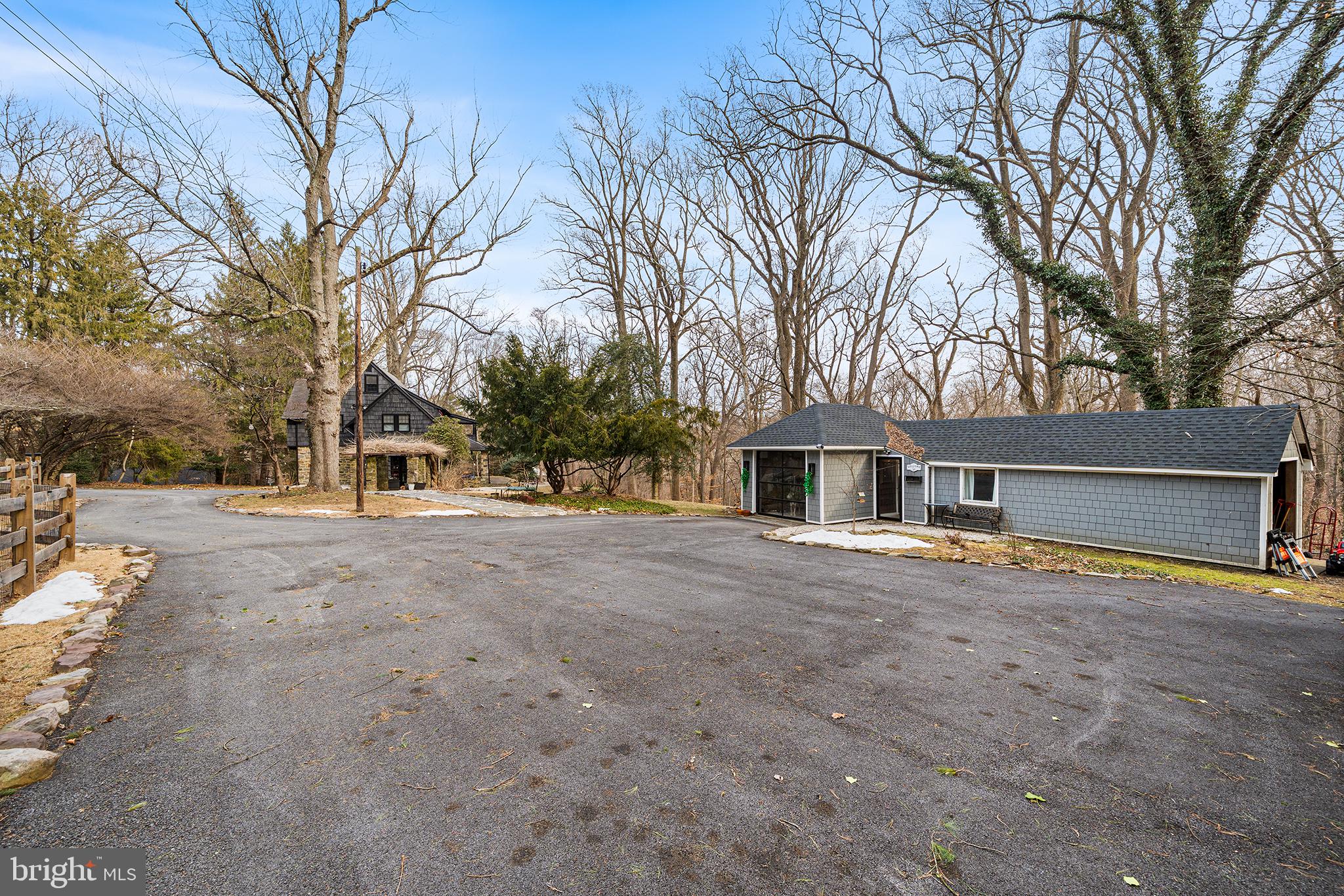 238 Fox Road Media, PA 19063 - Photo 53 of 74 a view of a house with a yard and large trees
