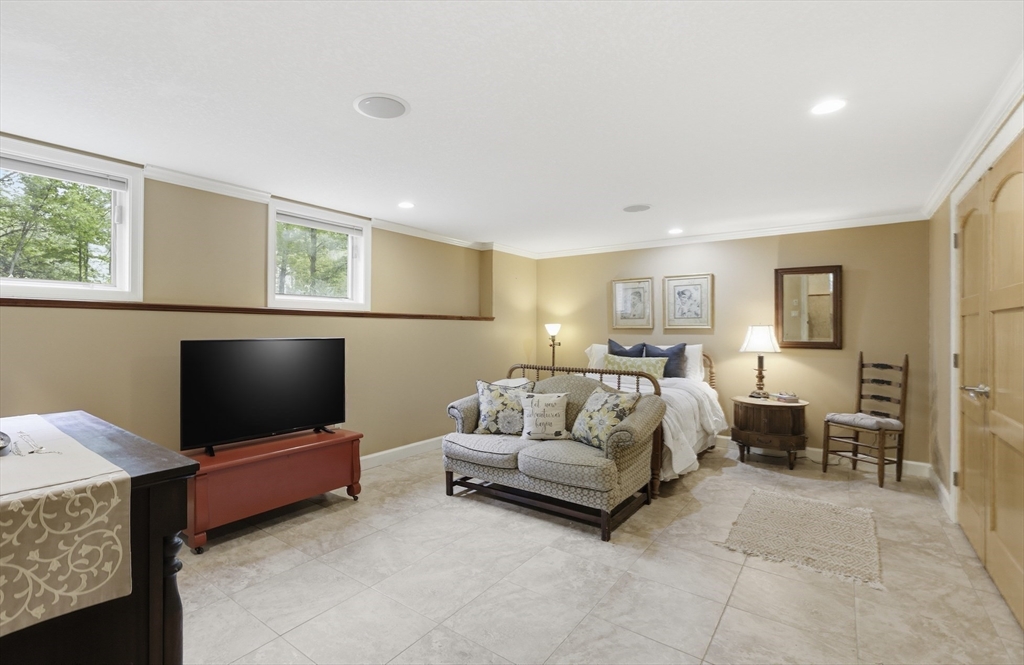 33 Labrie Lane Holyoke, MA 01040 - Photo 29 of 42 a living room with furniture and a flat screen tv