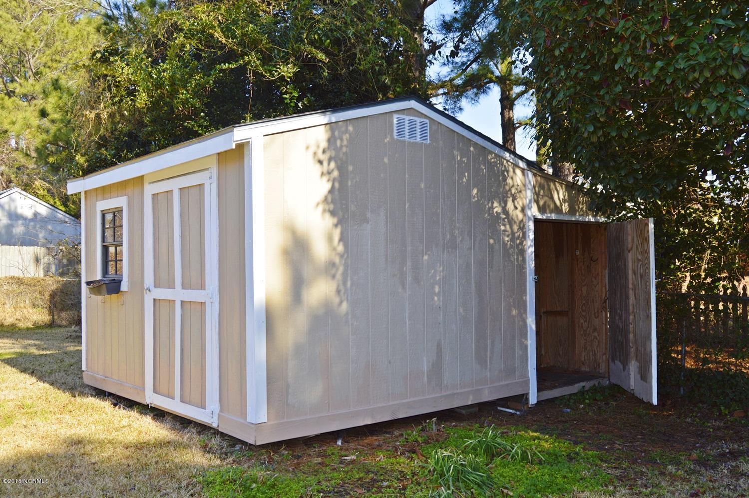 313 North Hampton Road Wilmington, NC 28409 - Photo 16 of 22 Wired shed has EXTRA storage in rear.
